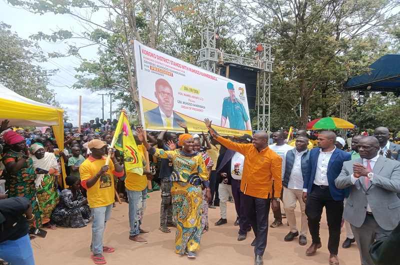 Hajjat Medina, Hon. Kabanda and Hon. Mawanda greeting the crowd that turned up in Koboko to endorse Gen. Muhoozi for Presidency on Wednesday