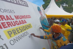 Hajjat Medina is joined by Koboko district leaders to endorse Gen. Muhoozi Kainerugaba for President at Koboko Boma Grounds on Wednesday