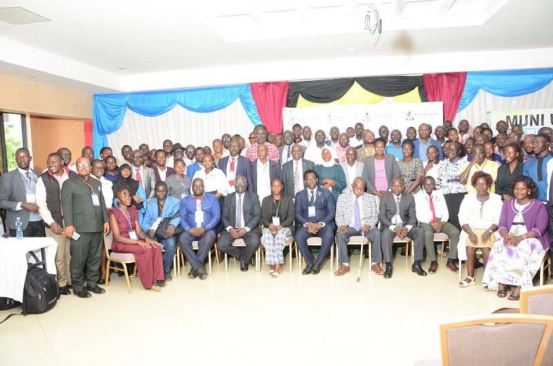 Participants pose for a group photo at the Muni University's 2nd Research Dissemination Conference at Desert Breeze Hotel on Wednesday.